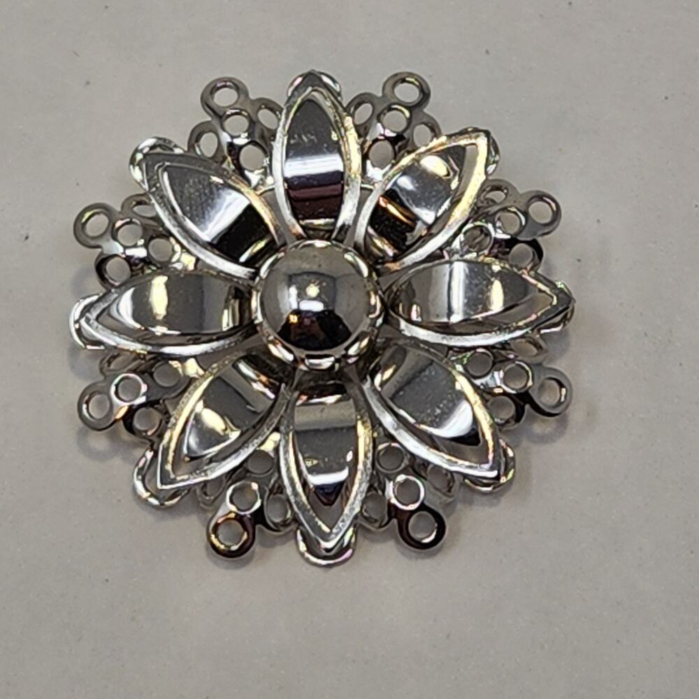 Coro Silver Tone Metal Flower Brooch Pin Modernist Floral 3D Layered Vintage